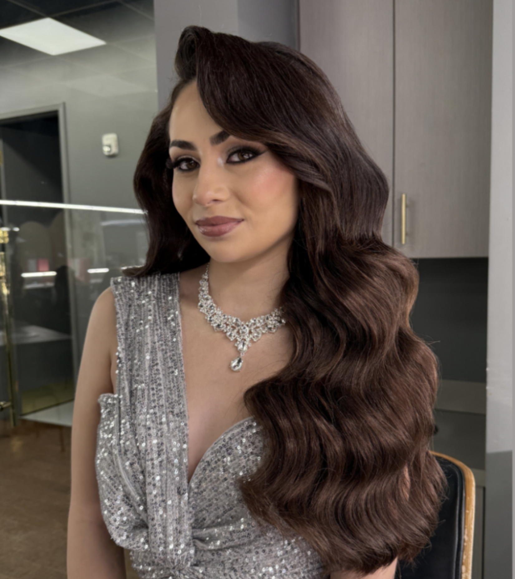 A bride styled with glamorous Hollywood Waves